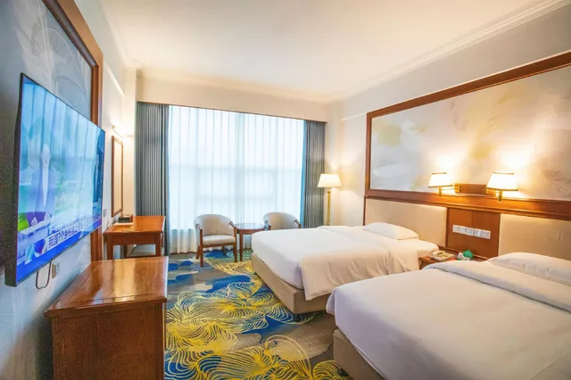 Yixin, Twin Beds، Gladden Hotel Fenggang 1/1