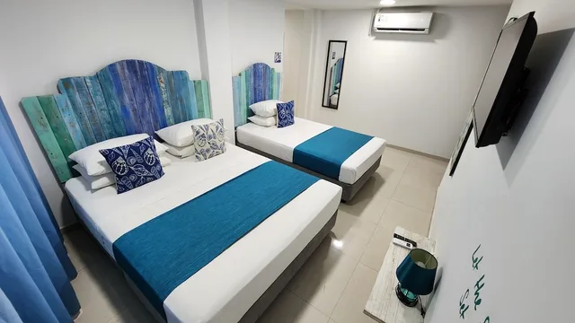 2 Bedrooms, Supreme, Suite, Twin Beds, Sofa، White Coral Apartasuites 1/7
