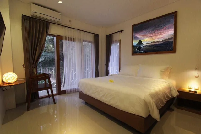 غرفة ديلوكس بسرير كينج، Onesouth Banyuwangi Pulau Merah 1/2