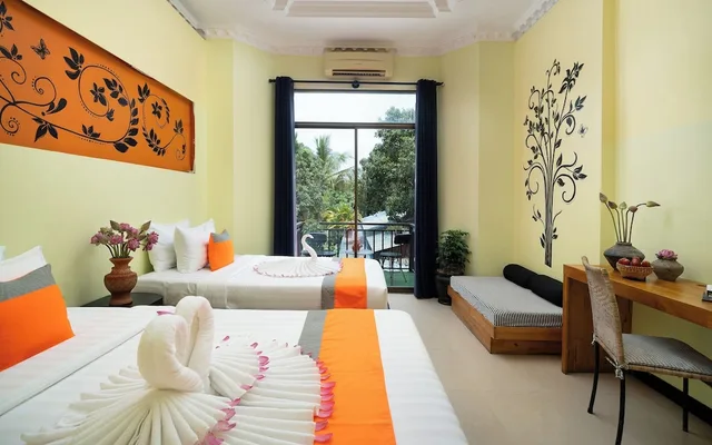 Deluxe, Family, 1 King and 1 Single Beds, Balcony, Central Indochine D Angkor Hotel 4/10