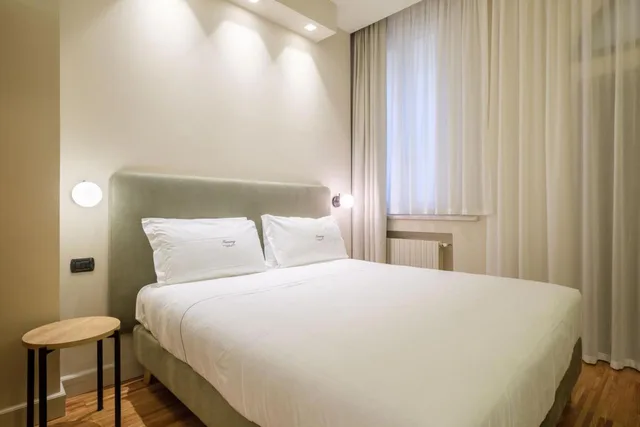 جناح جونيور مع أريكة، Touring Hotel Bologna 2/3