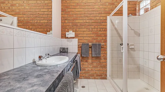 جناح ديلوكس بسرير كوين بمطبخ صغير، Golden River Motor Inn 4/4