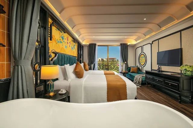 غرفة ديلوكس بسريرين منفصلين بشرفة، Grand Sunrise Palace Hoi An 1/4