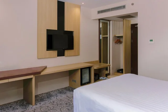 غرفة ديلوكس بسرير كينج، Aston Gorontalo Hotel & Convention Center 6/7