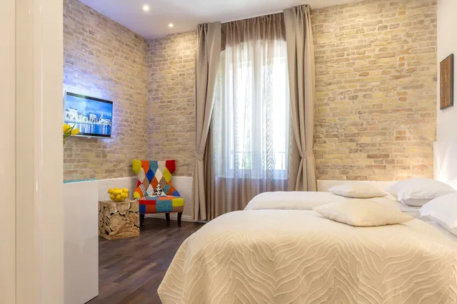 غرفة ديلوكس بسرير مزدوج أو سريرين منفصلين بإطلالة على المتنزه، Pellegrini Luxury Rooms 1/6
