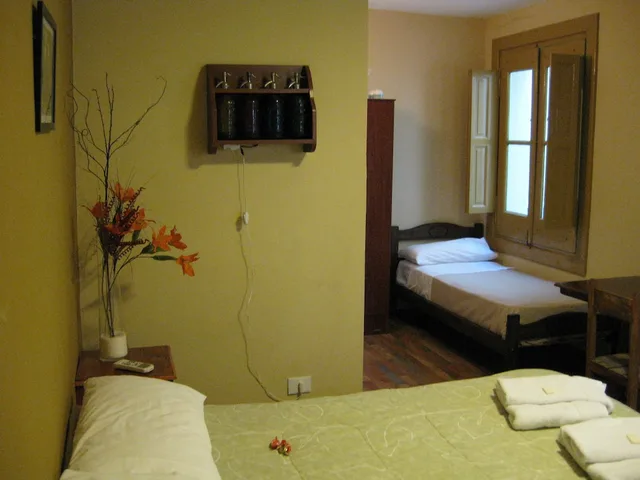غرفة ثلاثية بحمام خاص، Sabatico Travelers Hostel 2/2