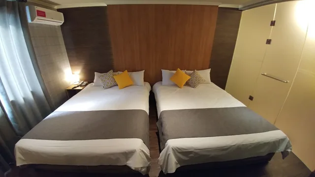غرفة قياسية رباعية بسريرين مزدوجين، HOTEL TONG YEONDONG JEJU 3/7