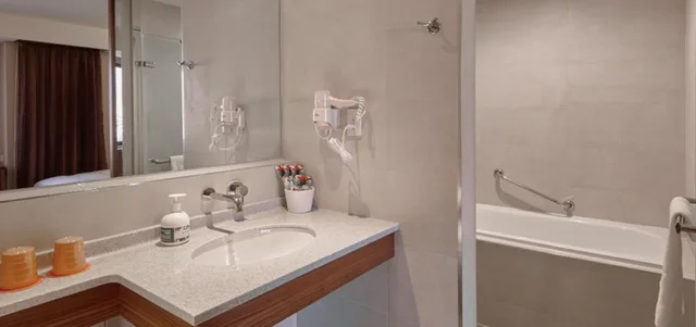 غرفة ديلوكس بسرير مزدوج أو سريرين منفصلين، Orange Hotel Wenhua 1/1