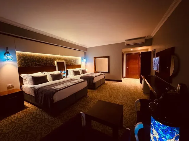غرفة ديلوكس رباعية بغرفة نوم واحدة، White Heaven Hotel 1/2