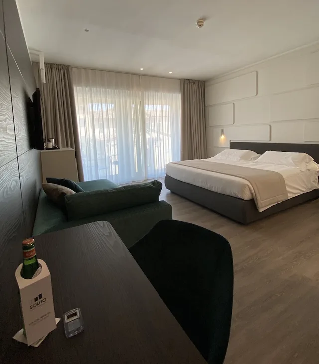 غرفة ديلوكس ثلاثية بسرير كوين وسرير فردي، Solho Hotel 7/10