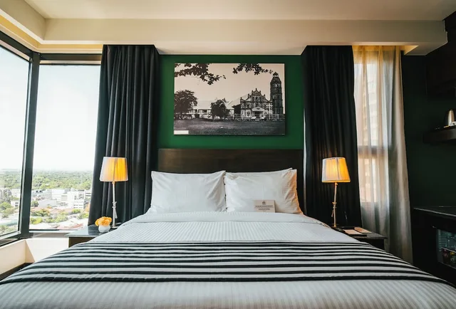 غرفة بريميوم ديلوكس بسرير كوين، 1898 Hotel Colonia En Las Filipinas 1/8