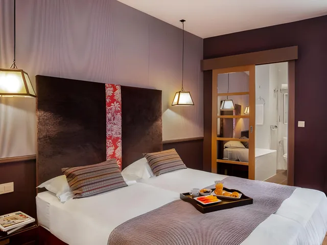 غرفة تنفيذية ثلاثية بسرير كوين وسرير فردي، Hotel Louison 1/1
