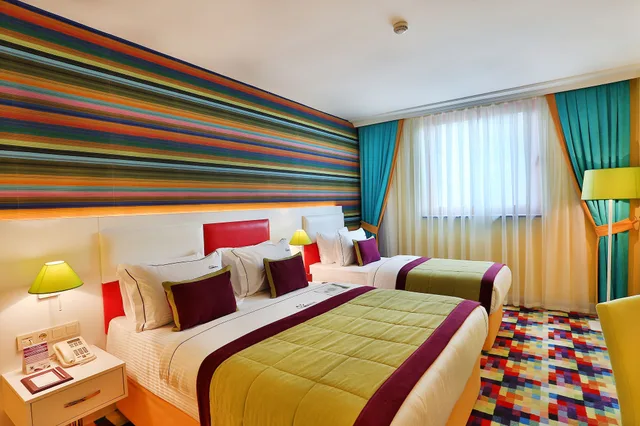 غرفة قياسية ثلاثية بسرير كينج وسرير فردي، Mayi Hotel 1/4