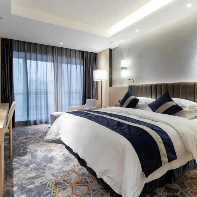 غرفة ديلوكس بسرير كينج بإطلالة على المدينة للمدخنين، Grand Metropark Hotel Liyuan Chongqing 5/8
