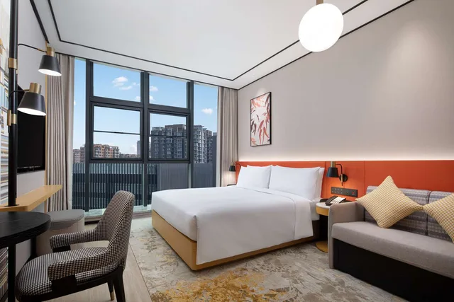 غرفة ديلوكس بسرير كينج مع أريكة، Hilton Garden Inn Beijing Huaxiang Tiantan Hospital 2/3