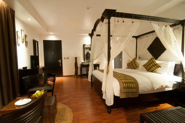جناح عائلي بسرير فردي وسريرين مزدوجين بإطلالة على المسبح، La Rose Suites 1/3