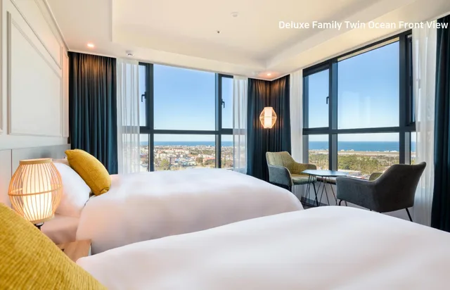 غرفة ديلوكس بسريرين منفصلين بإطلالة على البحر، Ventimo Hotel and Residence Jeju 1/10