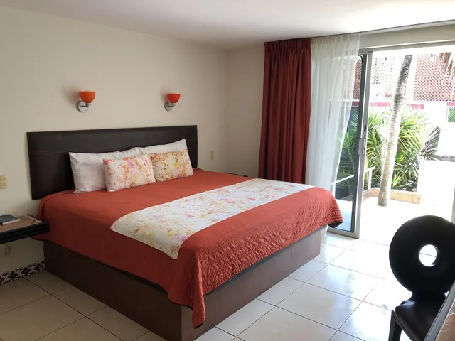 غرفة جونيور بسرير كينج وسريرين مزدوجين بغرفتي نوم، VF Villa Florencia Hotel 4/6