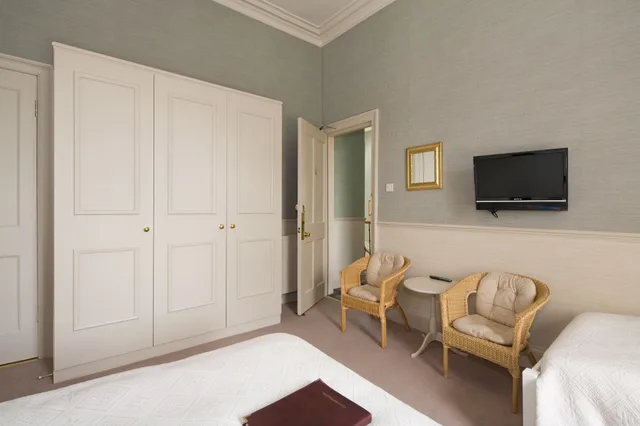 غرفة رباعية بسرير مزدوج وسريرين منفصلين، Sherwood Guest House 9/10