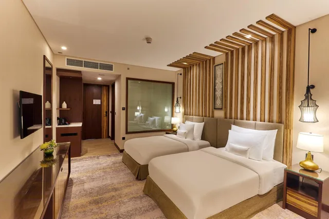 غرفة ديلوكس بسريرين منفصلين، Millennium Resort Salalah 2/5