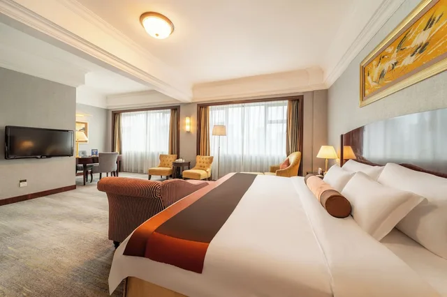 غرفة تنفيذية بسرير كينج، GRAND INTERNATIONAL HOTEL 3/7
