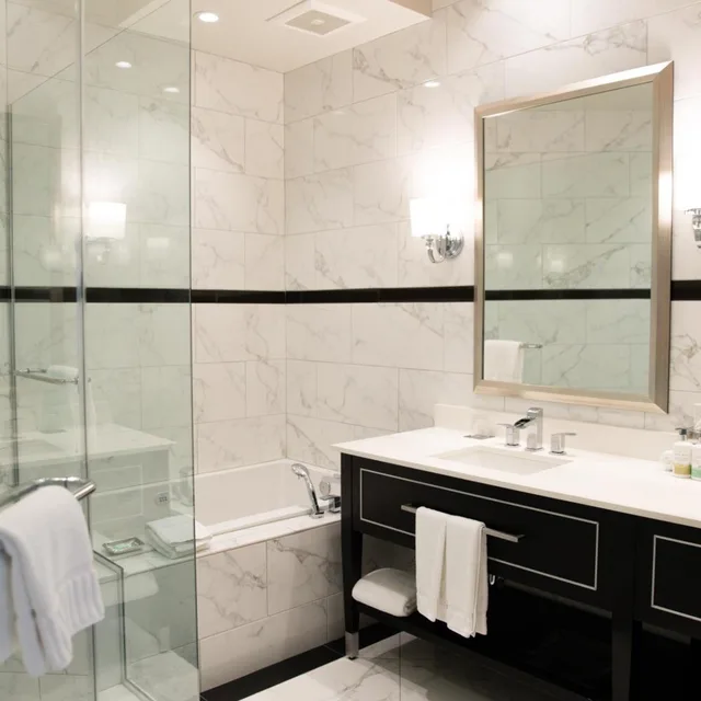 Club, Supreme, Suite, King Bed, Inn On Fifth 2/3
