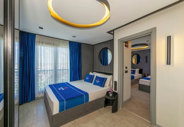 غرفة ديلوكس رباعية بسرير كوين وسريرين منفصلين، The Private Airport Hotel 4/7