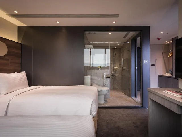 غرفة ديلوكس بسريرين منفصلين بإطلالة على المدينة بشرفة، Green World Hotel Songshan 4/7
