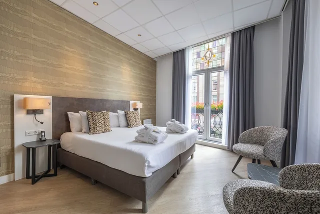 غرفة سوبيريور بسرير مزدوج بإطلالة على المدينة، Hotel Amsterdam - De Roode Leeuw 1/4