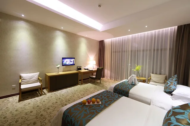 غرفة ديلوكس بسريرين منفصلين، Gin Mao Yuan Hotel Shenzhen 4/6