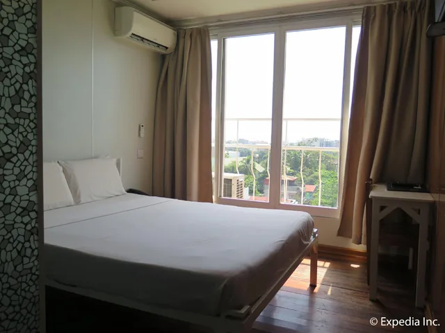 غرفة ديلوكس بسرير كينج، Hotel Uno 1/2