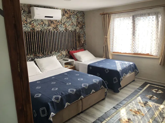 غرفة قياسية ثلاثية بسرير مزدوج وسرير فردي بإطلالة على المدينة، Frau Guler Boutique Hotel 2/5