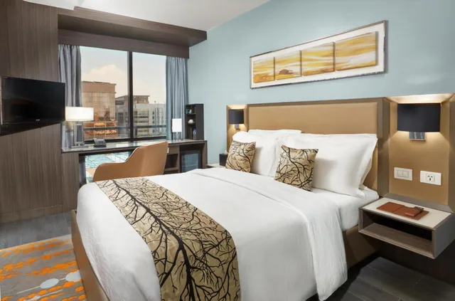 Tranquility Queen Room، Belmont Hotel Manila 2/6
