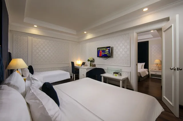 غرفة متصلة عائلية بسرير كينج وثلاثة أسرّة بغرفتي نوم، L Heritage Hanoi Hotel 1/8