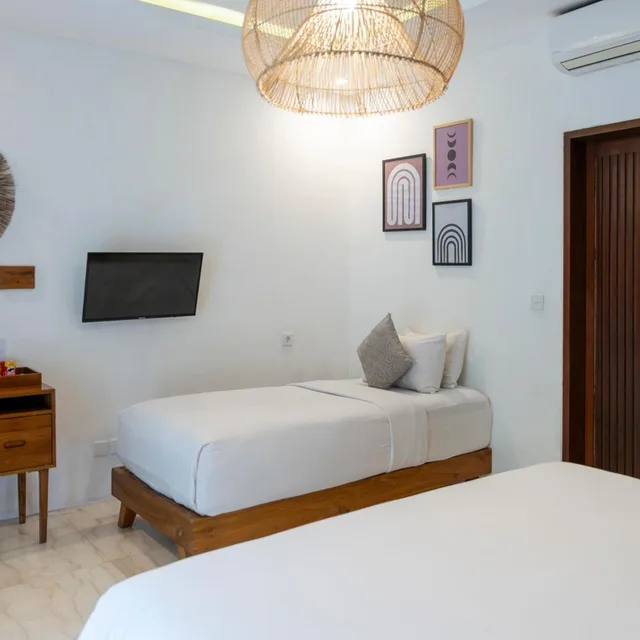 غرفة ديلوكس ثلاثية بسرير فردي، Tamantara Suites & Villa by ZUZU 1/9