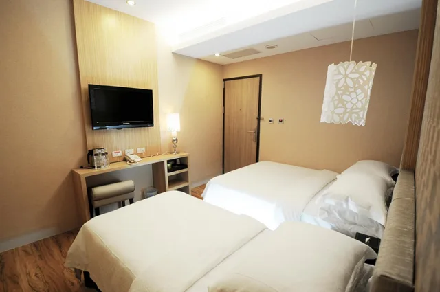 غرفة ثلاثية بسرير مزدوج وسرير فردي، The Riverside Hotel Hengchun 1/2