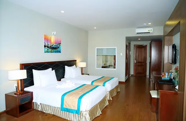 غرفة ديلوكس بسريرين منفصلين بإطلالة على الحديقة، Sandunes Beach Resort Spa 1/8