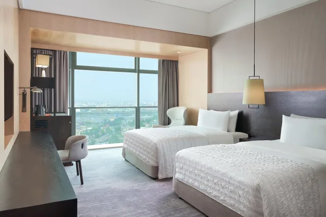 غرفة تنفيذية بسريرين منفصلين، Le Meridien Zhongshan 1/3