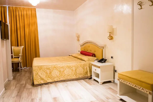 غرفة بسرير كينج بجاكوزي، Palace Hotel la Conchiglia D Oro 2/6