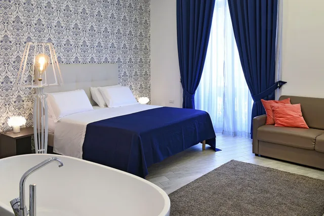 غرفة رئاسية بسرير كوين مع أريكة، Napoli Rooms&Suite 3/8