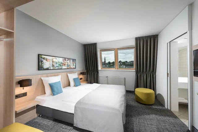 جناح بسرير مزدوج مع أريكة، Ramada Flensburg 1/4