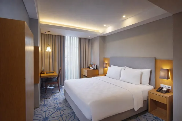 غرفة ديلوكس بسرير كوين للمدخنين، Swiss-Belhotel Pondok Indah 1/1