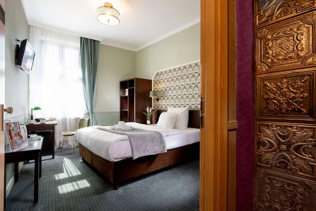 غرفة قياسية مفردة بسرير كوين، Hotel Amber 1/4