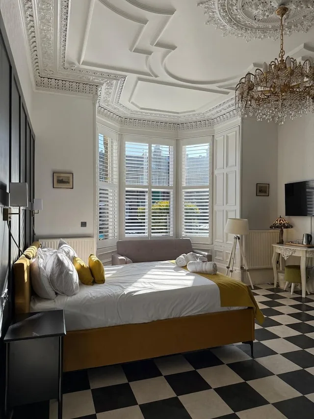 غرفة ديلوكس بسرير كينج، The International Guest House 1/4