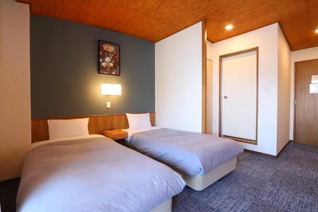 غرفة عائلية رباعية بأربعة أسرّة بإطلالة على البحر، Shinnishiki Hotel 1/6
