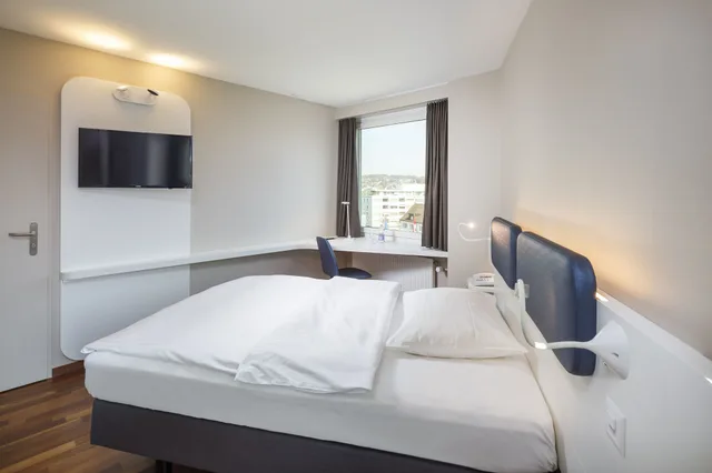 غرفة بسرير كوين، Welcome Inn Comfort 1/3