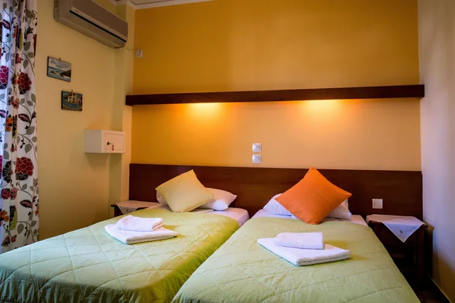 شقة عائلية بسريرين منفصلين بغرفة نوم واحدة مع أريكة، Oasis Apartments 1/10