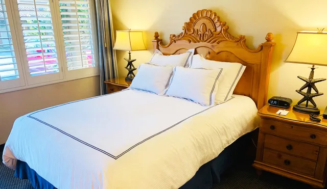 غرفة بسرير كوين، Franciscan Inn & Suites 2/5