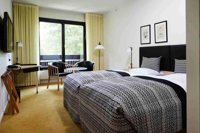 غرفة بسرير مزدوج أو سريرين منفصلين، Munkebjerg Hotel 4/10