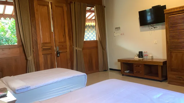 غرفة بريميير ديلوكس بسريرين منفصلين، Pesona Osing Hotel Butik 2/4